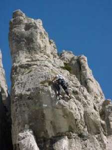 Climbing one of the routes on La Baume rock at Sisteron